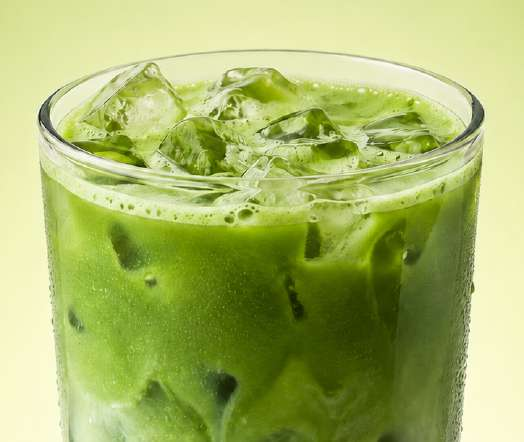 Iced matcha latte with milk and ice